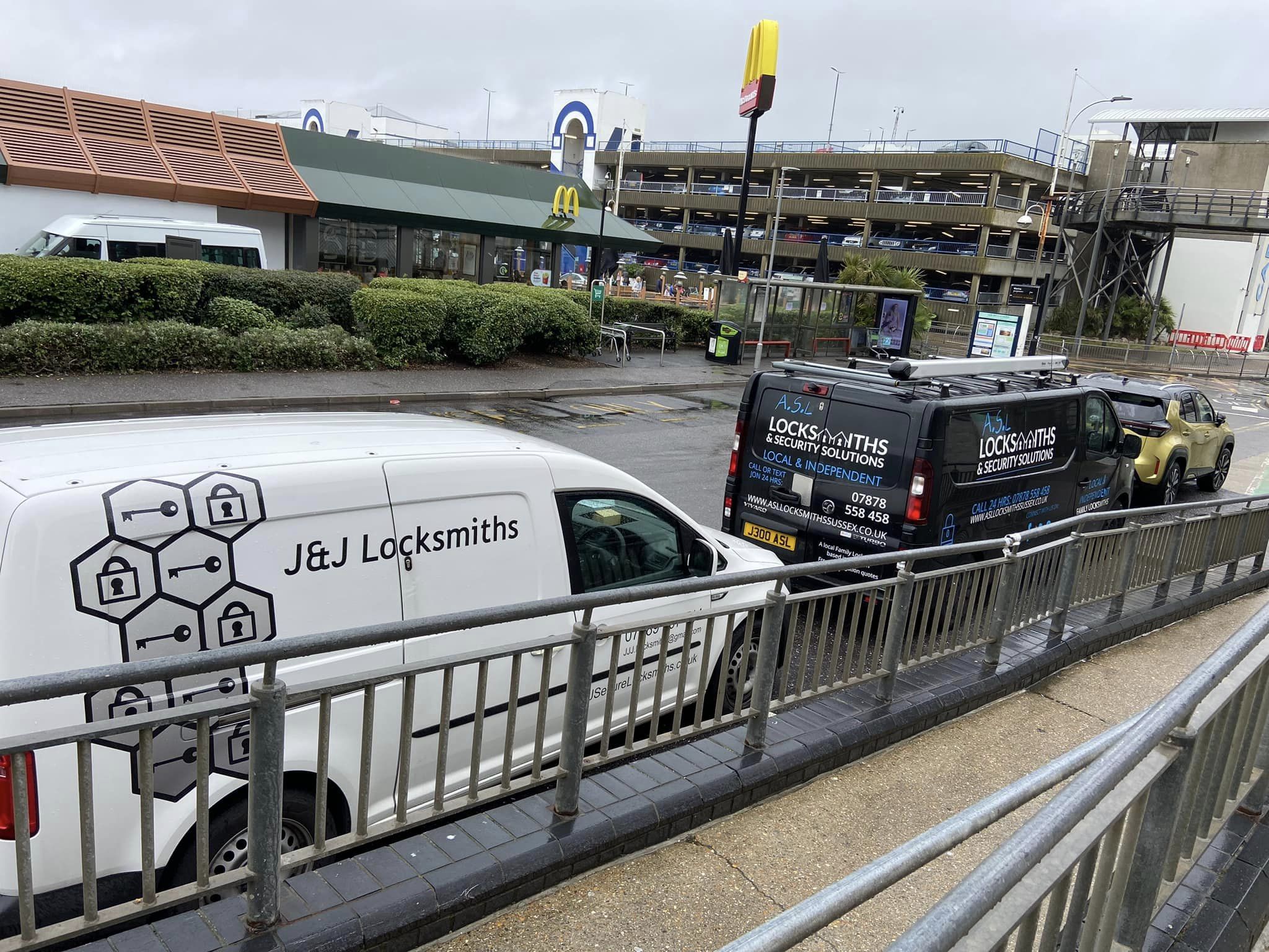 ASL Locksmiths and JJ Locksmiths vans