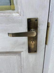 antique brass lock handle
