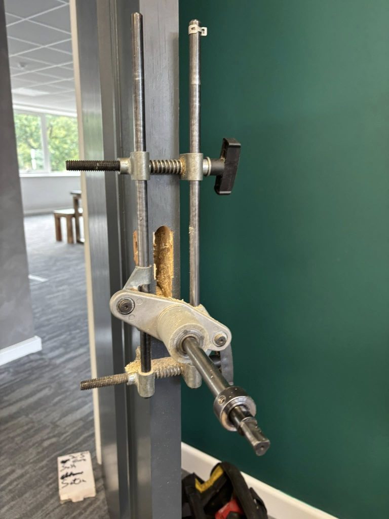 Mortice lock jig for cutting a recess in a door