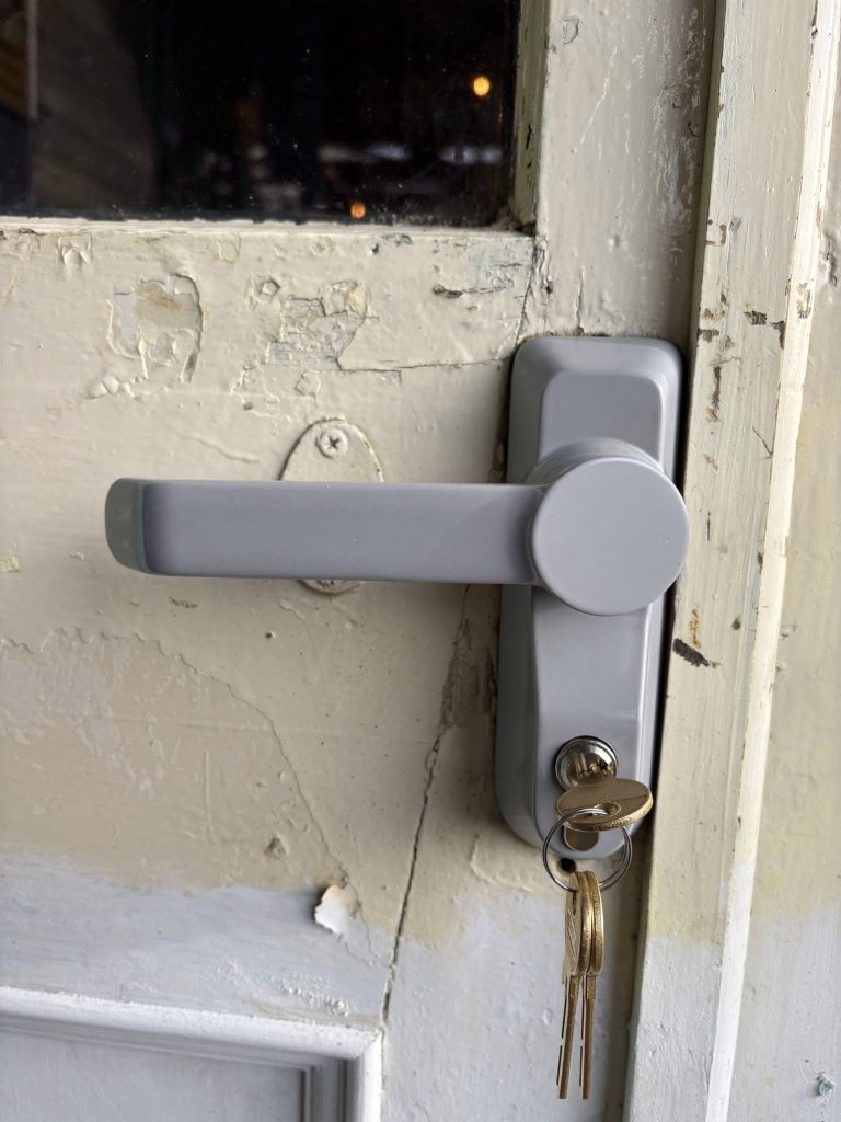 Fire door lock with the key in