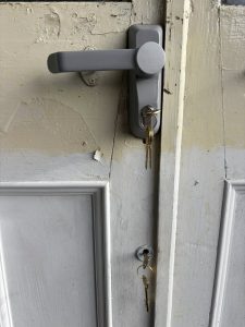 Door with two keys in the keyholes