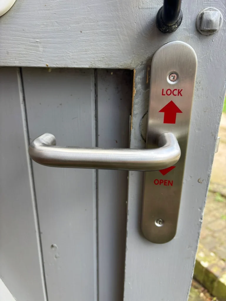 RADAR disabled toilet door lock and handle front view
