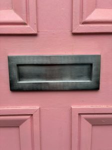 Letterbox installation for a wooden door in Brighton